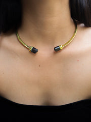 Detail view of Brown Tourmaline Dravite crystal tip in a gold-plated brass choker end.
