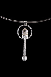 Vera Cruz Amethyst oxidized sterling silver spoon pendant shown on a choker with pale purple crystal setting.