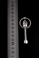 Vera Cruz Amethyst sterling silver spoon pendant shown beside a ruler for scale with solid cast silver body.