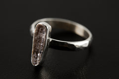 Side view of Vera Cruz Amethyst ring with high-shine 925 silver band, hammered texture, and raised crystal setting.
