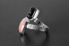 Side view of adjustable Dravite Tourmaline Sunstone ring showing open band, bezel settings, and textured silver detail.