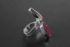 Side view of Tiger Eye Raw Ruby adjustable ring showing bezel settings, oxidized texture, and open-back construction.