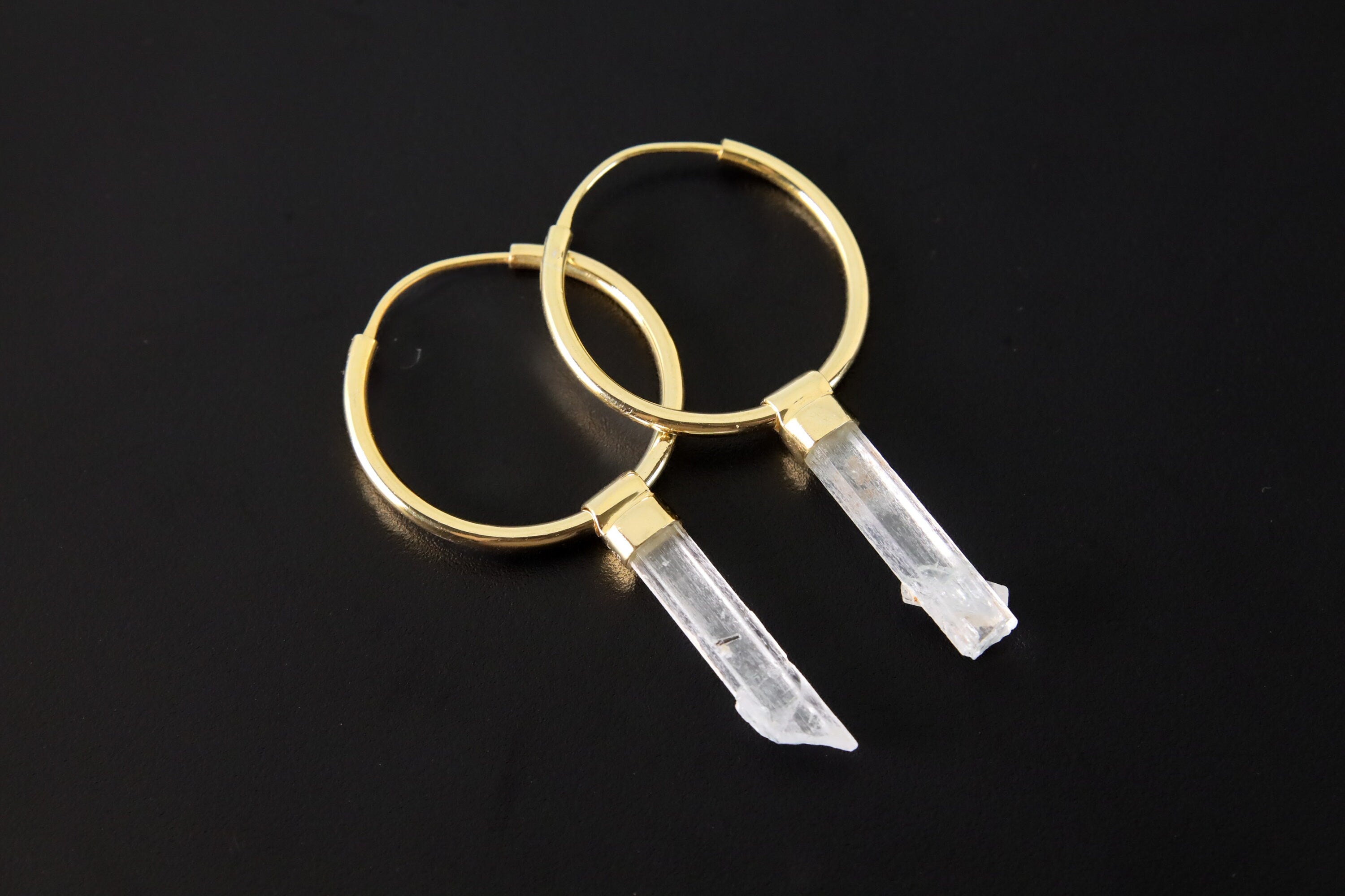 Australian Aquamarine convertible hoop earrings in gold-plated 925 sterling silver with pale blue crystal drops.