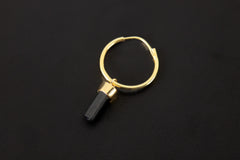 Golden Black Tourmaline Guardian earring pendant shown on dark background with polished gold-plated hoop.