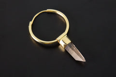 Lemurian Citrine single hoop earring shown on dark background with gold-plated sterling silver hoop and crystal point.