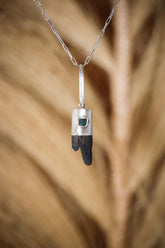 Himalayan Brown Dravite Tourmaline Diamond pendant on white background, with sand-textured sterling silver and rounded halo bail.