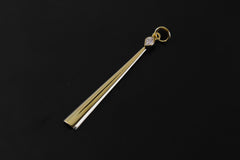 Herkimer Diamond ceremonial scoop pendant shown worn by a model, with slim 18k gold-plated silver form.