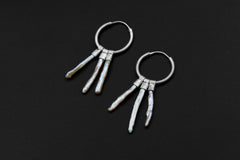 Moonlit Pearl stack hoop earrings shown on dark background with large sterling silver hoops and three Pearl dangles.