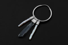 Clear Quartz Pearl stack hoop earrings shown on dark background with sterling silver hoops and luminous crystal dangles.