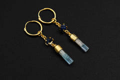 Sapphire Aquamarine hoop earrings shown as a pair with gold-plated sterling silver and blue gemstone dangles.