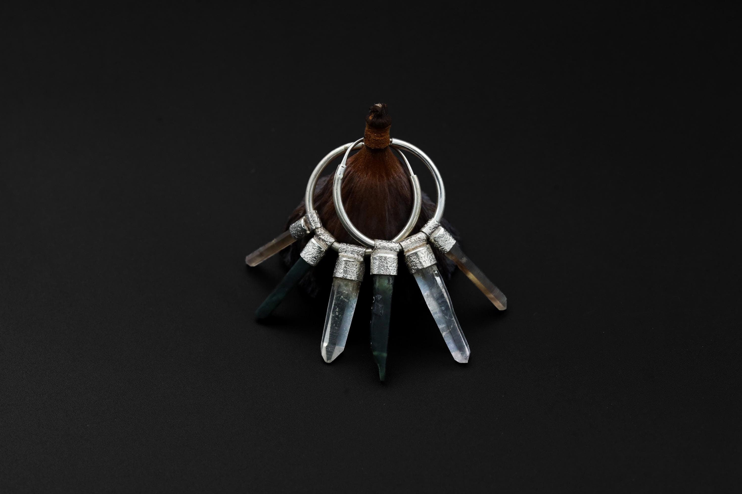 Green Jade Smoky Quartz Clear Quartz stack hoop earrings shown on dark background with sterling silver hoops.