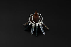 Green Jade Smoky Quartz Clear Quartz stack hoop earrings shown on dark background with sterling silver hoops.