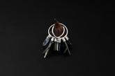 Himalayan Chlorite Quartz Green Tourmaline Clear Quartz stack hoop earrings shown on dark background with sterling silver hoops.
