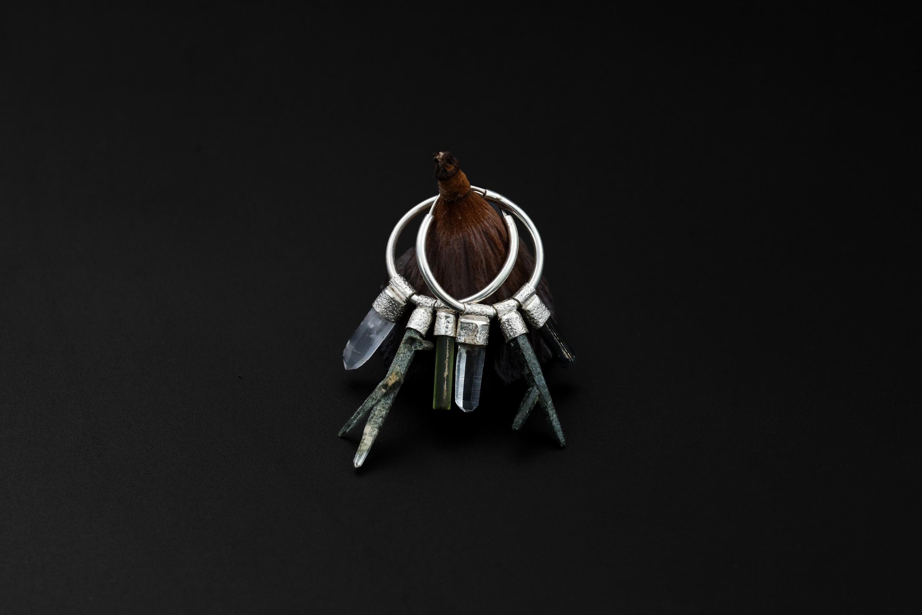 Himalayan Chlorite Quartz Green Tourmaline Clear Quartz stack hoop earrings shown on dark background with sterling silver hoops.