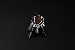 Himalayan Chlorite Quartz Green Tourmaline Clear Quartz stack hoop earrings shown on dark background with sterling silver hoops.