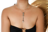 Celestial Sky Journey pendant shown worn on a model, with Ethiopian Opal, Labradorite, Moonstone, Clear Quartz, and oxidized silver.