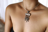 Lightning Ridge Opal Kunzite Moonstone Aquamarine pendant shown worn on a model, with oxidized sterling silver and pastel gemstone dangles.