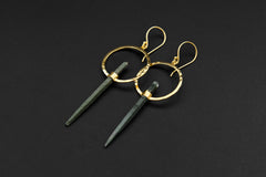 Close-up of Himalayan Chlorite Phantom Quartz earrings showing circular portal forms, gold accents, and oxidized silver texture.