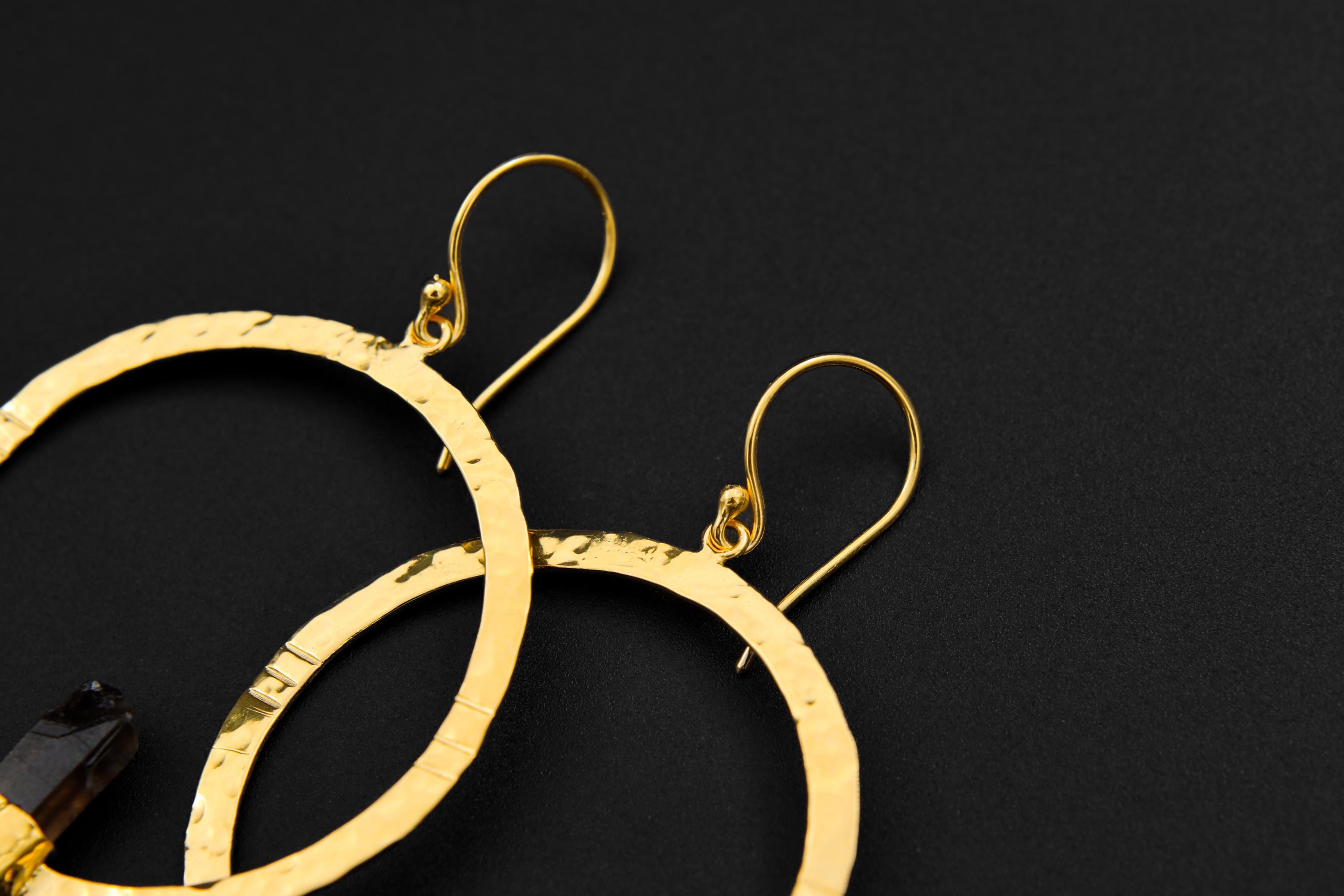 Smoky Quartz portal earrings shown with gold-plated hooks, silver texture, and earthy brown crystal points.