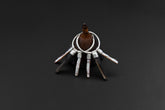 Smoky Quartz Pearl stack hoop earrings shown on dark background with sterling silver hoops and earthy crystal dangles.