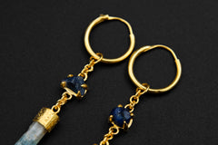 Petite Sapphire and Aquamarine hoop earrings shown close-up with 18k gold-plated sterling silver hoops.