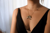 Hand-fossicked Australian Quartz point pendant shown worn on a gold-toned necklace, with 18k gold-plated sterling silver cap.