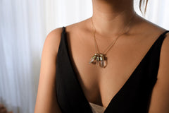 Hand-fossicked Australian Quartz point pendant shown worn on a gold-toned necklace, with 18k gold-plated sterling silver cap.