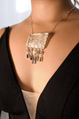 Rainbow Inclusion Quartz Tourmaline Opal necklace shown worn on the chest, with five dangling gemstone chains in sterling silver.