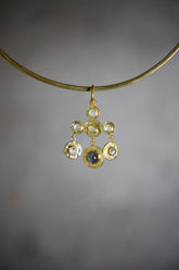 Blue Moonstone Ethiopian Opal Labradorite pendant in 18k gold-plated sterling silver, shown on a dark background.