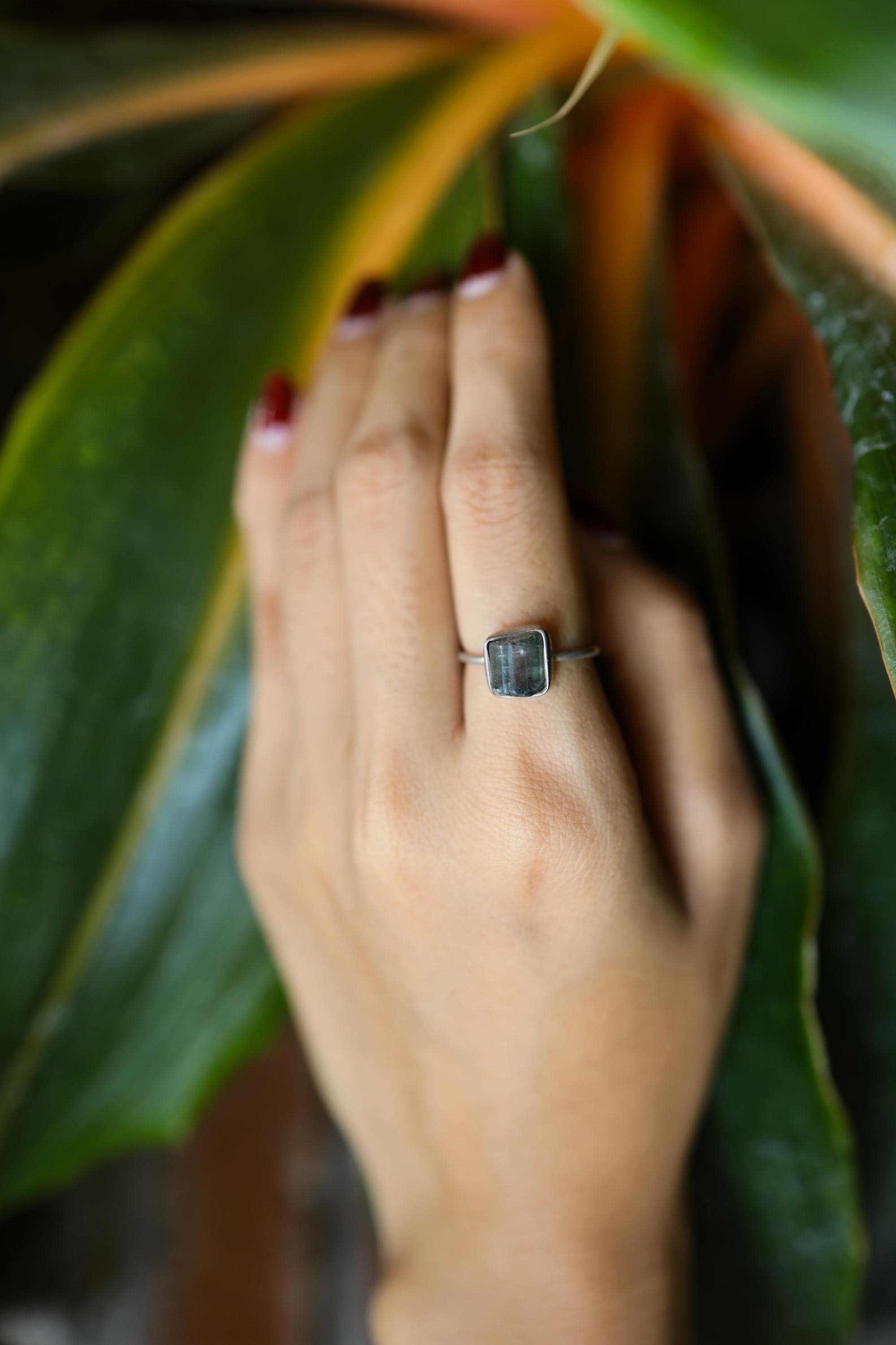 Handmade 925 sterling silver Watermelon Tourmaline stack ring shown worn on the hand, with raw pink green crystal.