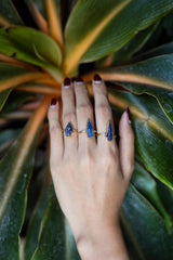Lapis Lazuli Gold Plated Silver Ring shown worn on the hand with rich blue gemstone and warm gold plated setting.