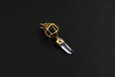 Himalayan Lemurian Quartz and Blue Moonstone pendant shown on a dark background, with 18k gold-plated geometric cage frame.