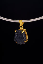 Darwin Glass Tektite pendant displayed on choker with gold-plated sterling silver setting.