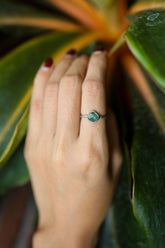 Handmade 925 sterling silver Australian Raw Emerald stack ring shown worn on the hand, with green beryl stone and fine band.