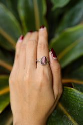 Pink Tourmaline Silver Ring shown worn on hand with soft rose gemstone and handmade sterling silver band.