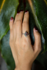 Handmade 925 sterling silver Watermelon Tourmaline ring shown worn on the hand, with pink and green crystal colour zoning.