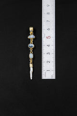 Zircon Australian Opal Blue Moonstone Herkimer Diamond and South Sea Pearl pendant shown beside a ruler for scale, measuring approximately 6.5 cm long.