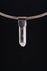 Water Clear Nepalese Inclusion Quartz pendant shown worn on a silver choker with dark oxidized 925 silver cap.