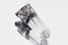 Close-up of Water Clear Nepalese Inclusion Quartz with natural internal veils and hand-hammered oxidized silver setting.