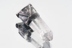 Close-up of Water Clear Nepalese Inclusion Quartz with natural internal veils and hand-hammered oxidized silver setting.