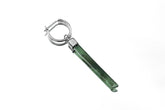 Green Jade single hoop earring in 925 sterling silver shown worn on the ear with a polished green stone drop.
