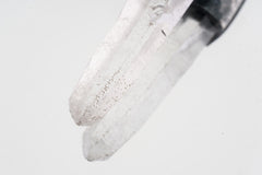Close-up of Water Clear Nepalese Inclusion Quartz with natural internal veils and hand-hammered oxidized silver setting.
