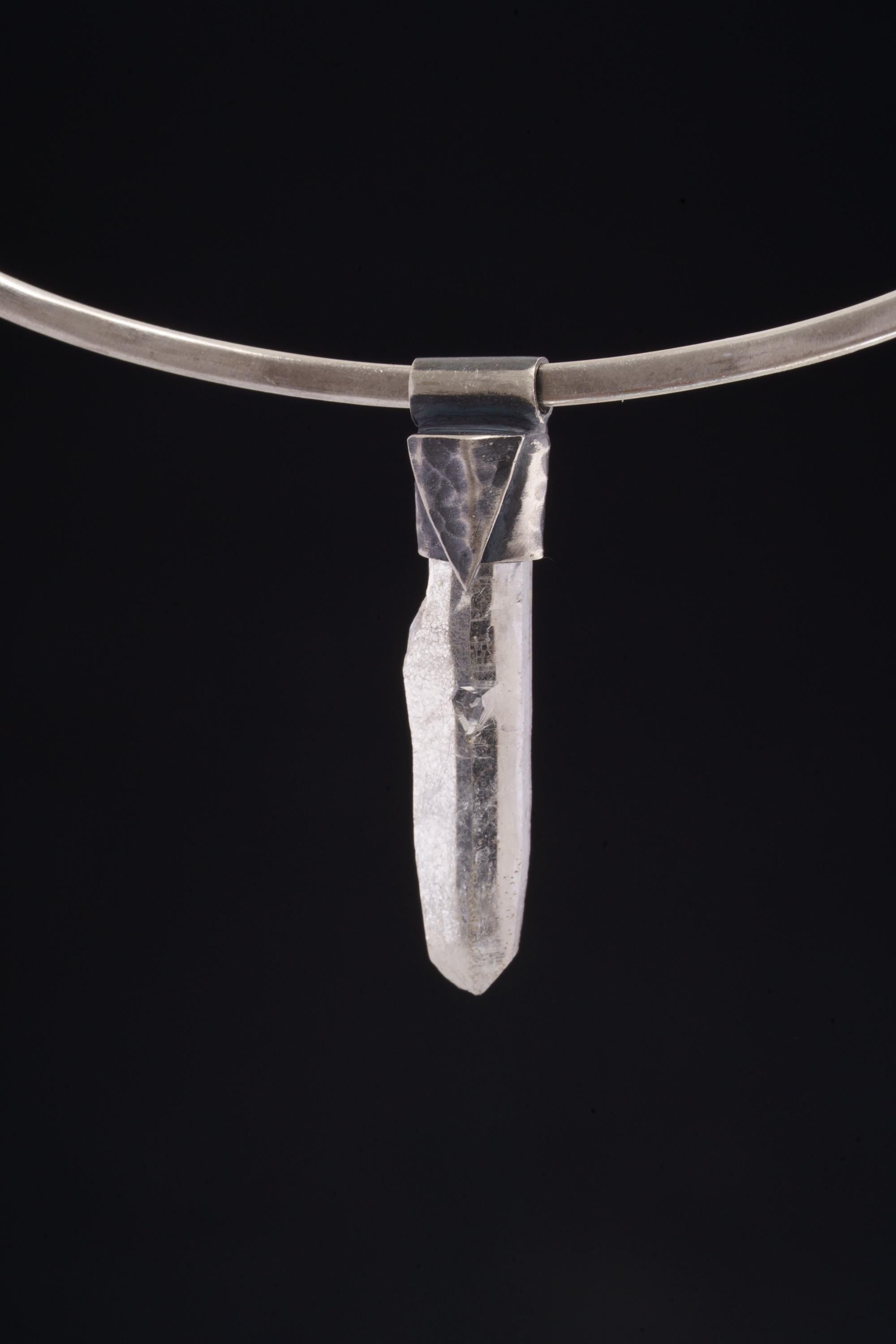 Water Clear Nepalese Inclusion Quartz pendant shown worn on a black background as a clear crystal layering necklace.
