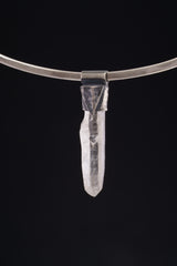 Water Clear Nepalese Inclusion Quartz pendant shown worn on a black background as a clear crystal layering necklace.
