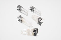 Water Clear Nepalese Inclusion Quartz pendant shown as part of a small clear crystal pendant collection.