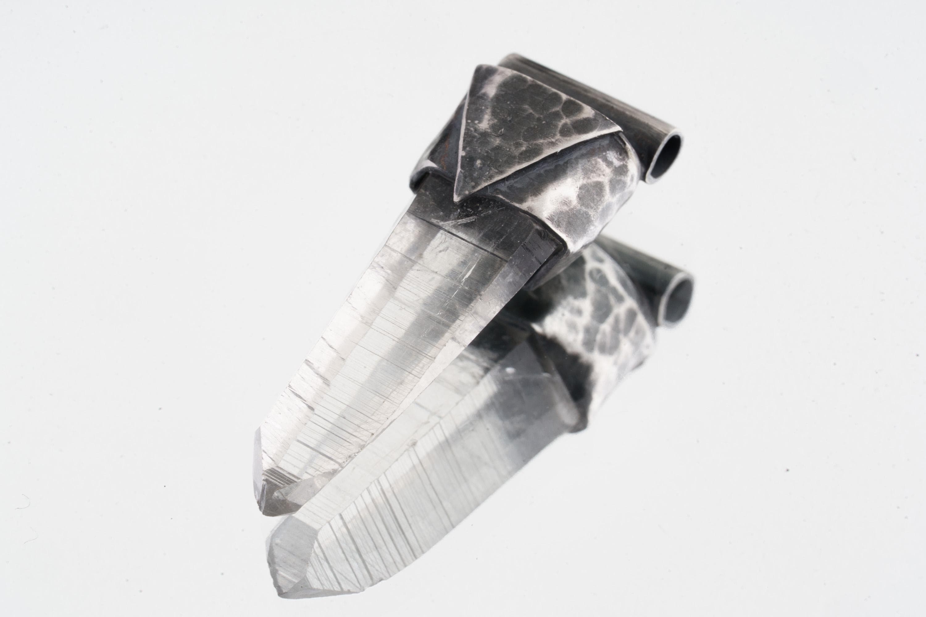 Water Clear Nepalese Inclusion Quartz Pendant shown on white background with hand-hammered geometric silver cap and clear crystal body.