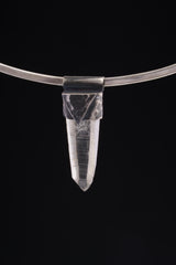 Water Clear Nepalese Inclusion Quartz Pendant shown on black background with silver choker and clear included crystal drop.