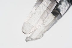 Close-up of Water Clear Nepalese Inclusion Quartz with natural internal veils and oxidized sterling silver setting.