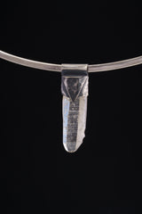 Water Clear Nepalese Inclusion Quartz pendant shown worn on a silver choker with dark oxidized 925 silver cap.