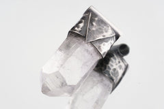 Water Clear Nepalese Inclusion Quartz Pendant shown on white background with hand-hammered geometric silver cap and clear crystal body.